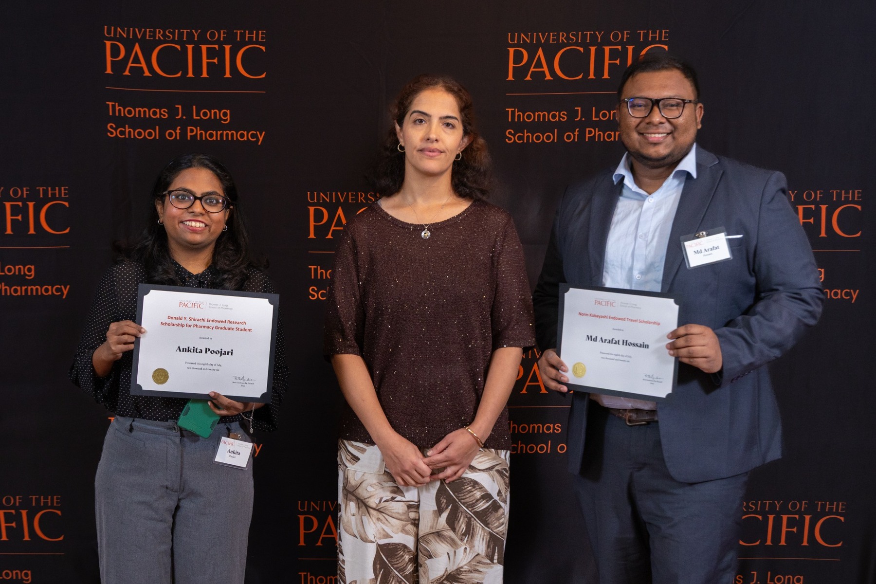 Dr. Atefeh Rabiee with graduate students Ankita Poojari and Md Arafat Hossain at the Scholarship Luncheon 2026